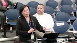 Jadine Chou, head of safety and security for Chicago Public Schools, tells the school board about the district&apos;s agreement with Chicago police.