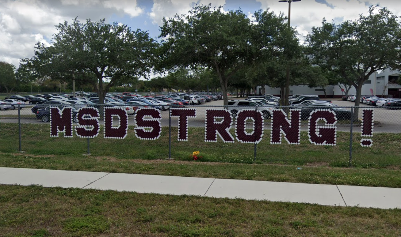 A fence on the campus of Marjory Stoneman Douglas High School in Parkland, Fla.