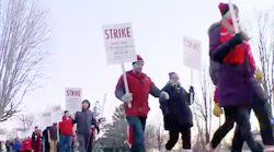 Teachers on strike in St. Paul, Minn., walk the picket line.