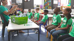 Students and teachers learning about recycling
