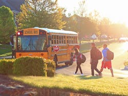 Kids getting on school bus Kids getting on school bus