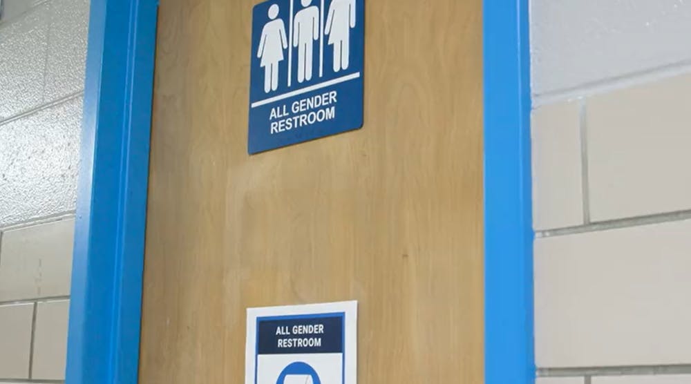 Gender inclusive restroom signs at Chicago Public Schools