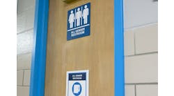 Gender inclusive restroom signs at Chicago Public Schools