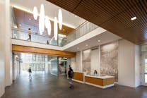 The open transparency of the ground-level lobby at the University of Virginia&apos;s center provides a passageway through all interior levels and invites students in.