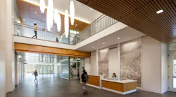 The open transparency of the ground-level lobby at the University of Virginia's center provides a passageway through all interior levels and invites students in.