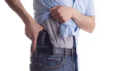 Person carrying gun