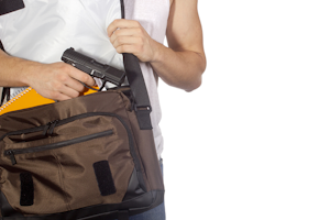 Teacher carrying gun