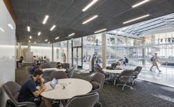 Study and seminar rooms at the McKinney Engineering Library at the University of Texas at Austin are accessible directly from the atrium, and centrally situated support staff and collections are on the floor above. Study and seminar rooms at the McKinney Engineering Library at the University of Texas at Austin are accessible directly from the atrium, and centrally situated support staff and collections are on the floor above.