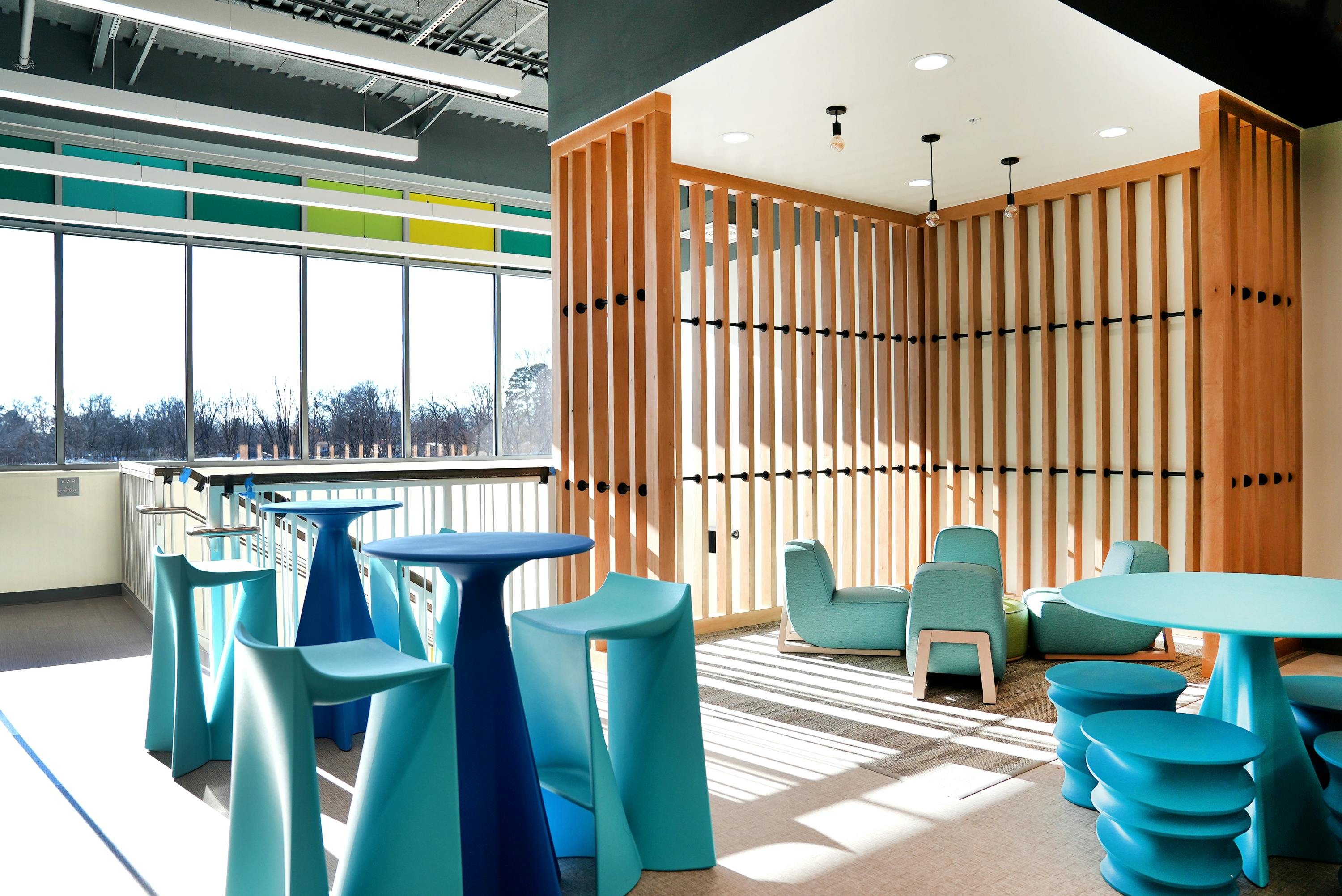 A variety of seating options at Peck K-8 Expeditionary Learning School creates a 'Panera-like' feel for students eating lunch, studying or socializing.