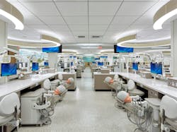 BKP spent several months researching trends in dental education and undertook a feasibility study before redesigning the University at Buffalo’s School of Dental Medicine Pre-Clinical Simulation Center. The lab redesign eschews traditional rows of benches in favor of clustered workstations, where students can naturally assume collaborative roles. BKP spent several months researching trends in dental education and undertook a feasibility study before redesigning the University at Buffalo’s School of Dental Medicine Pre-Clinical Simulation Center. The lab redesign eschews traditional rows of benches in favor of clustered workstations, where students can naturally assume collaborative roles.