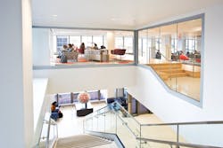 Fire-rated glazing in Alan Magee Scaife Hall preserves open sightlines and access to daylight around central staircase. Fire-rated glazing in Alan Magee Scaife Hall preserves open sightlines and access to daylight around central staircase.