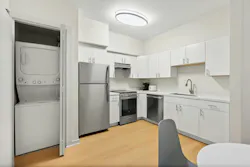 Student apartment kitchen with full size appliances and laundry facilities