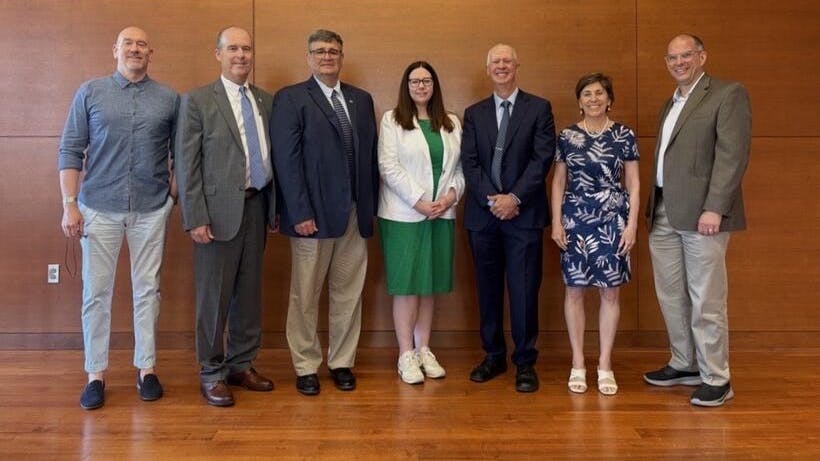 Group of Massachusetts state officials involved in funding energy efficiency grants to state colleges and universities.