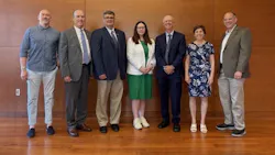 Group of Massachusetts state officials involved in funding energy efficiency grants to state colleges and universities.