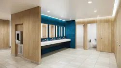 Contemporary restroom with full-height stalls in wood finish with integrated sinks in foreground against teal wall.