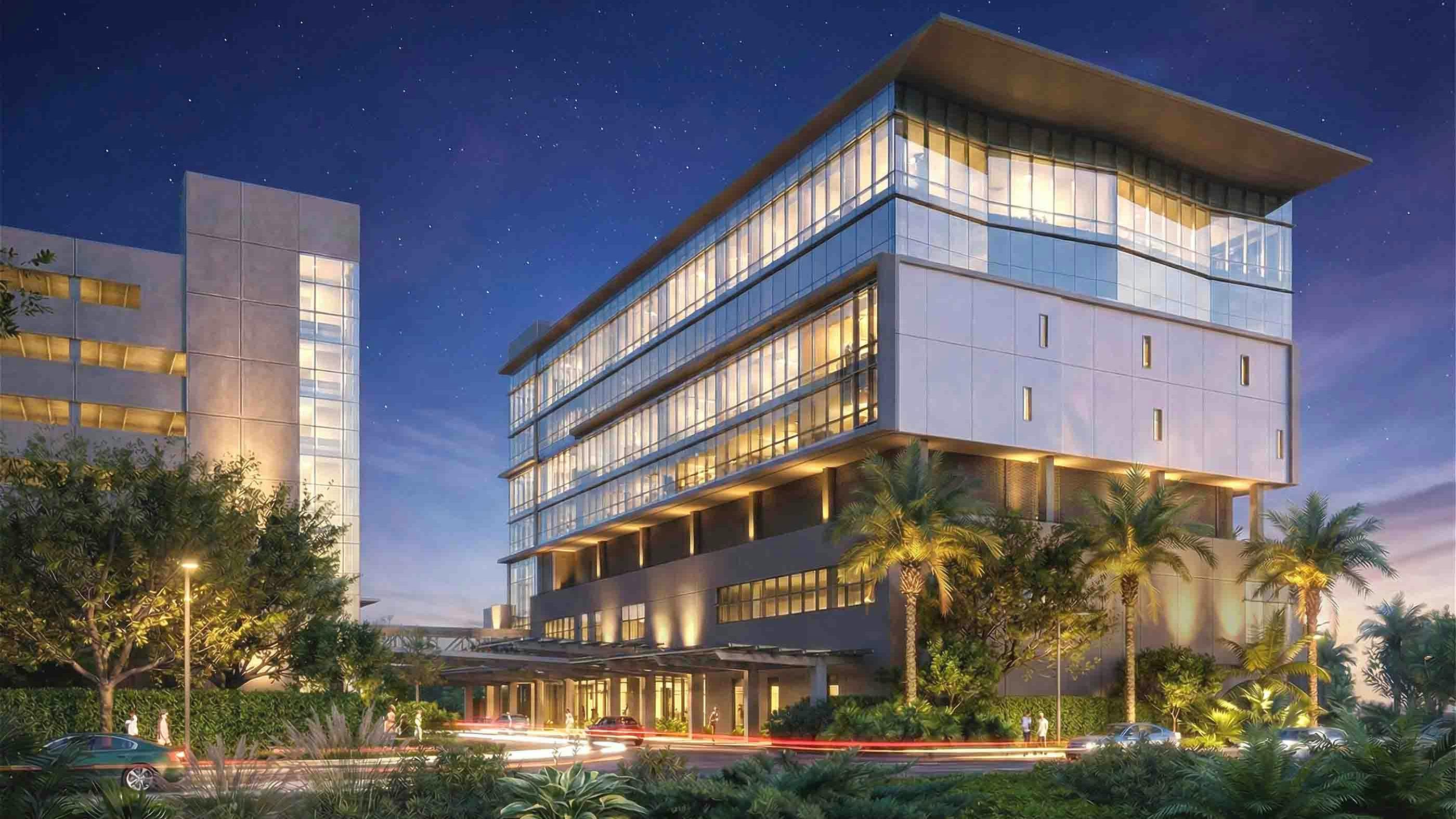 Rendering of new planned medical center at FIU in Miami at night.