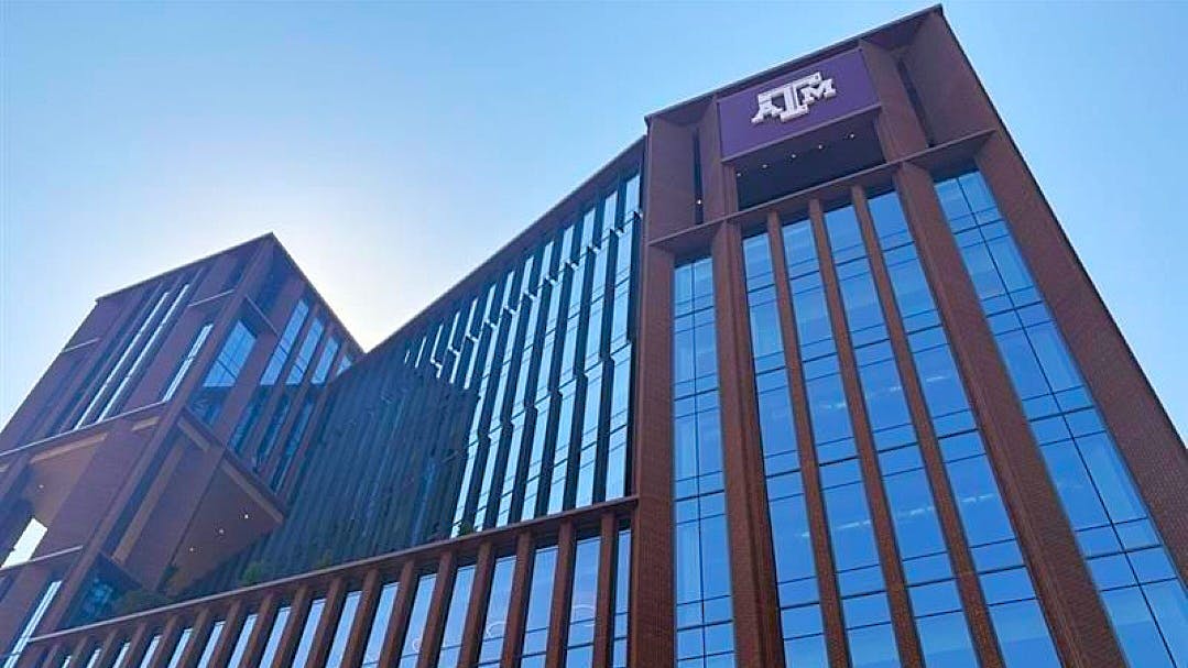 Facade of new brick and glass law and education building at Texas A&M-Ft. Worth.