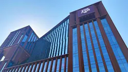 Facade of new brick and glass law and education building at Texas A&M-Ft. Worth.