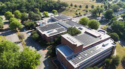 Aerial view of Virginia middle school with massive solar panel array.