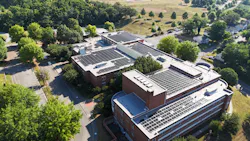Aerial view of Virginia middle school with massive solar panel array.