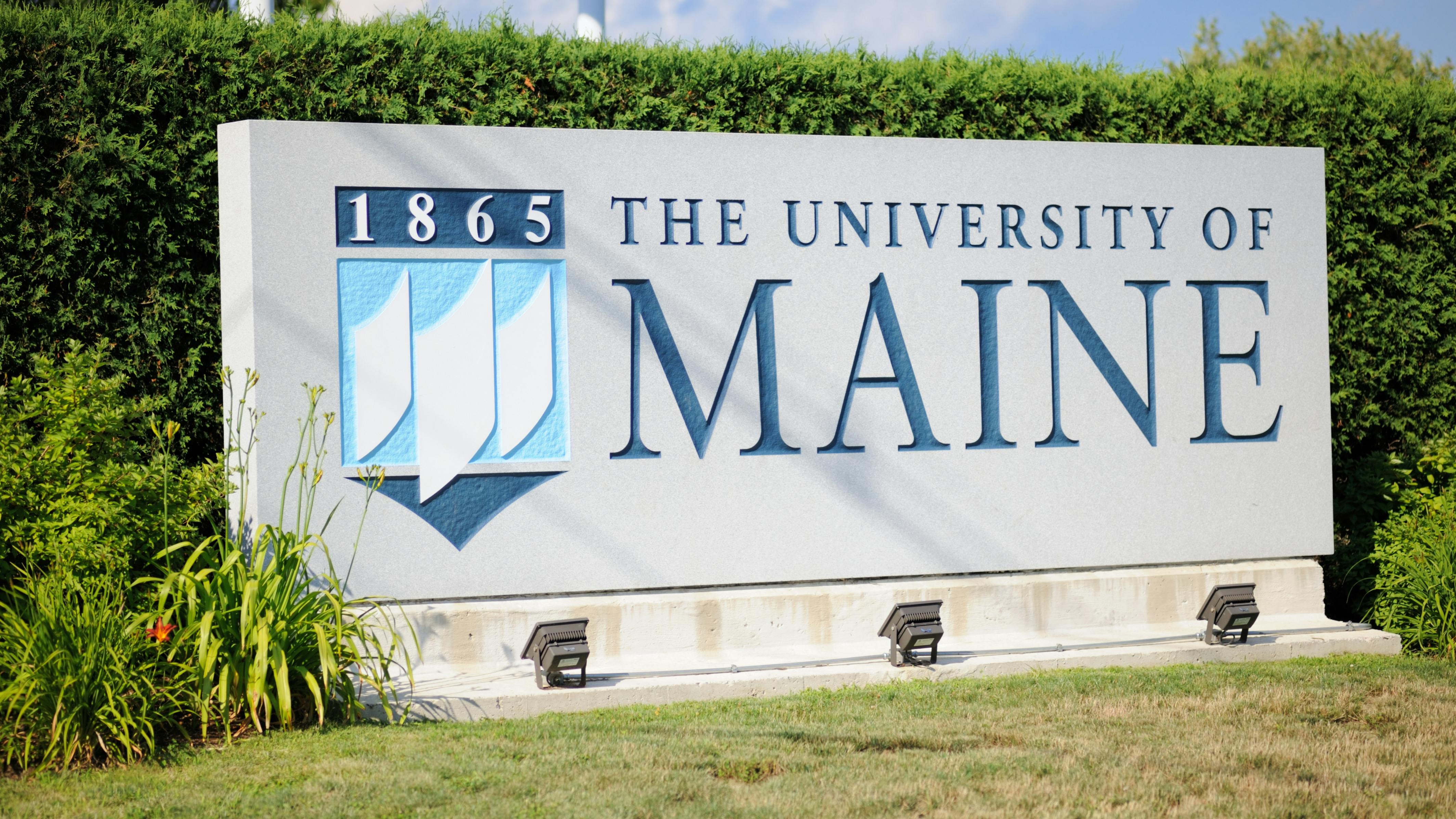 Sign for University of Maine entering campus.