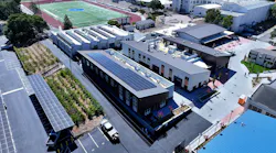 Aerial view of new career technical education center at Analy High School with solar arrays on roof.