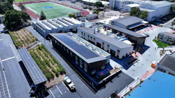 Aerial view of new career technical education center at Analy High School with solar arrays on roof.