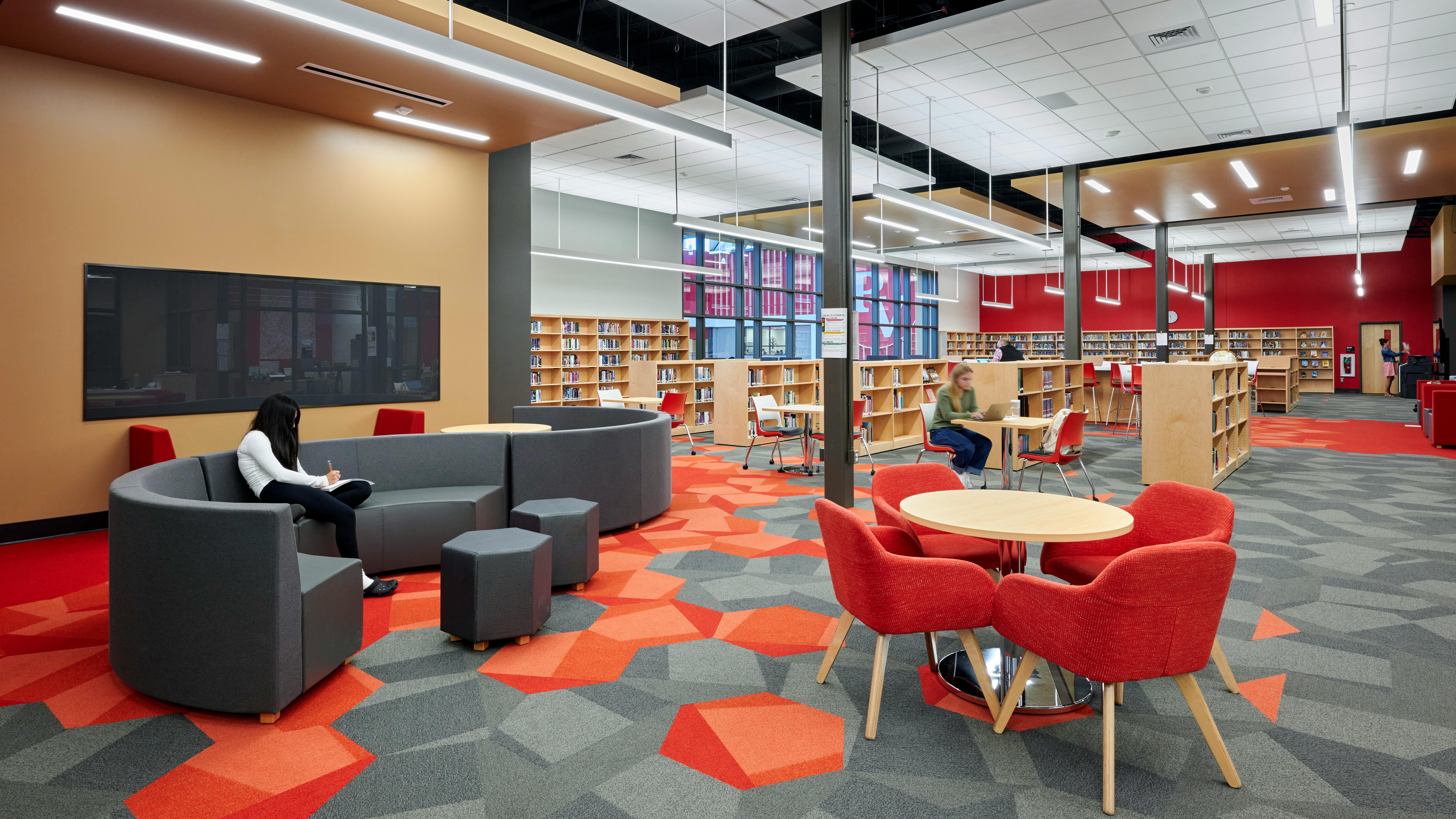 Contemporary lounge seating area in media center.